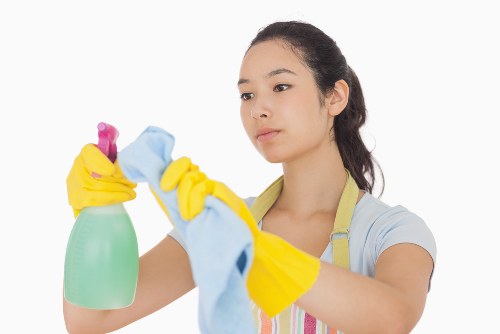 Professional cleaner in Brompton preparing a modern home for cleaning