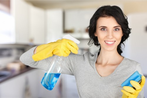 Professional office cleaners maintaining a Brompton business interior