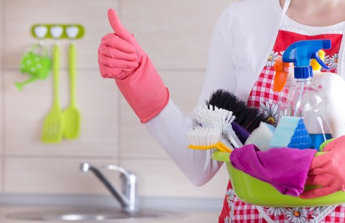 Clearance workers sorting reusable household items in Brompton